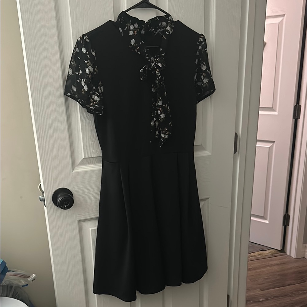 Elegant Black Dress with Floral Lace Sleeves